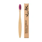 Purple bamboo toothbrush with a flat head and tapered bristles for effective and eco-friendly oral care.
