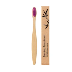 Purple bamboo toothbrush with a flat head and tapered bristles for effective and eco-friendly oral care.