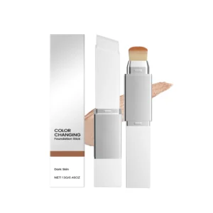 Close-up of the AMZ Dark Skin Color Changing Foundation Stick with its detachable brush, showcasing its creamy texture and sleek packaging.